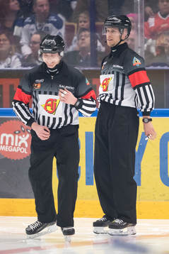 domare Mikael Andersson och domare Andreas Harnebring  i