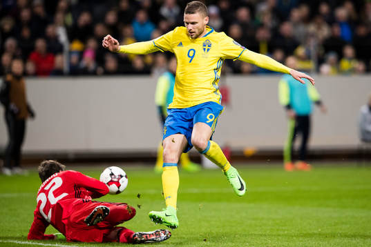 Belarus Andrei Gorbunov räddar en målchans från Sveriges