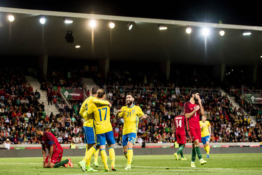 Sveriges Marcus Berg, Niklas Hult och Jimmy Durmaz jublar