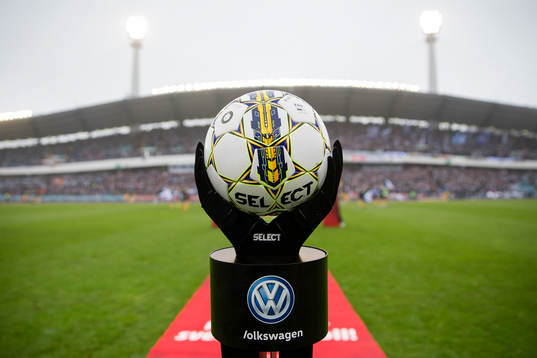 Matchbollen på ett podie