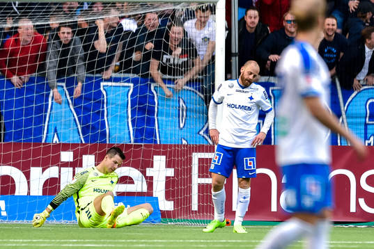 Norrköpings målvakt Michael Langer och Henrik Castegren