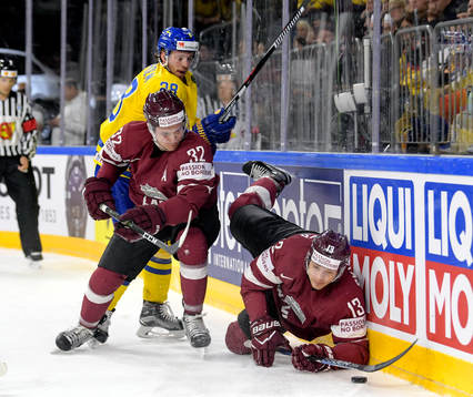 Sveriges Elias Lindholm och Lettlands Arturs Kulda och
