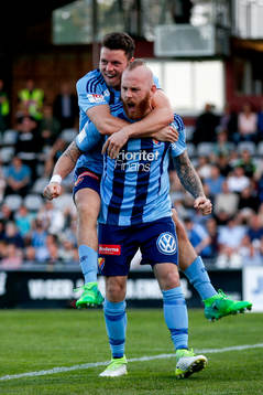 Djurgårdens Magnus Eriksson jublar med Kerim Mrabti