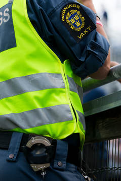 Ordningsvakt med handfängsel