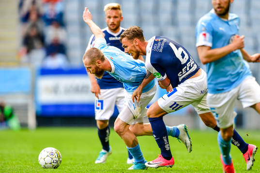 Malmö FFs Jo Inge Berget och Norrköpings Linus Wahlqvist