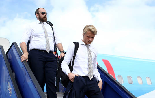 Kasper Dolberg of Ajax arrives with team mates