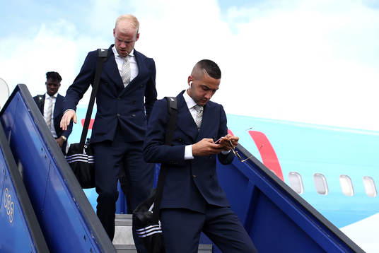 Davy Klaassen(L) and Hakim Ziyech of Ajax arrive