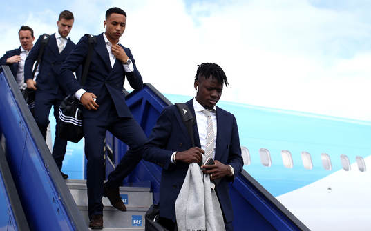 Bertrand Traore of Ajax arrives with team mates