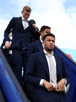 Jairo Riedewald of Ajax arrives with team mates