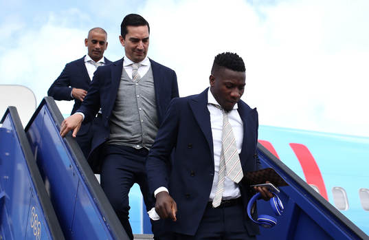 Andre Onana of Ajax arrives with team mates
