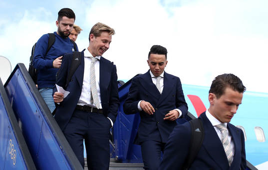 Frenkie de Jong(L) and ahead Abdelhak Nouri of Ajax arrive