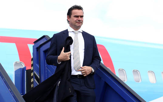 Marc Overmars arrives with the team