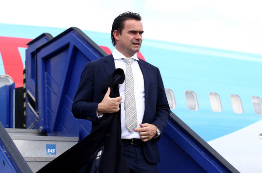 Marc Overmars arrives with the team