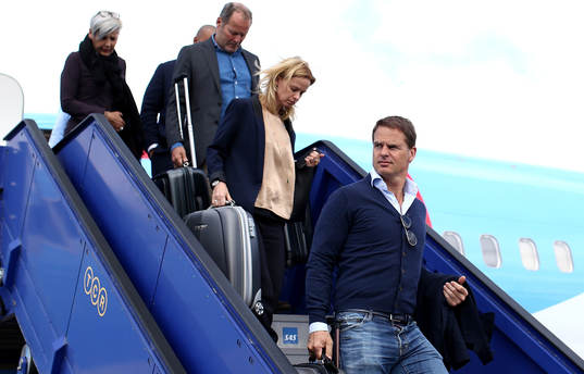 Frank de Boer(R) arrives with the Ajax team