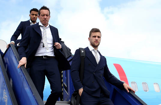 Joel Veltman of Ajax arrives with team mates