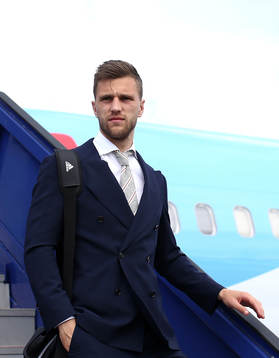 Joel Veltman of Ajax arrives with team mates
