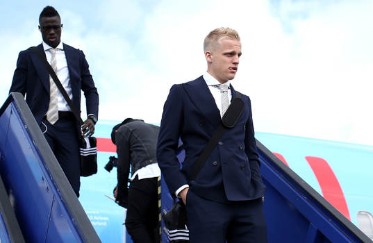 Donny van de Beek of Ajax arrives with team mates
