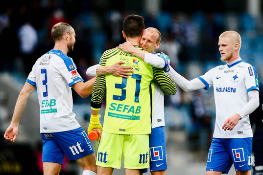 Norrköpings Andreas Johansson och målvakt Michael Langer
