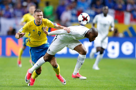 Sveriges Marcus Berg och Frankrikes Djibril Sidibe