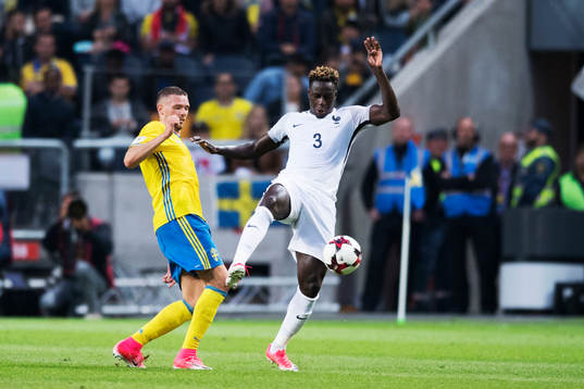 Sveriges Marcus Berg och Frankrikes Benjamin Mendy