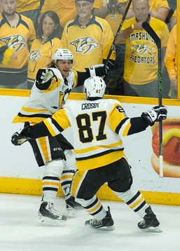 Pittsburgh Penguins Carl Hagelin celebrates with teammate