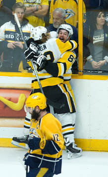 Pittsburgh Penguins Carl Hagelin celebrates with teammate