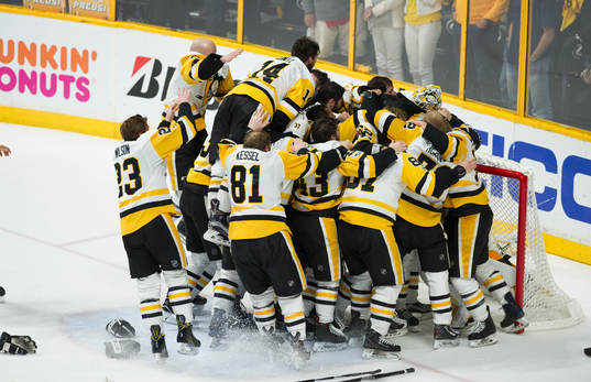 The Pittsburgh Penguins celebrate winning the Stanley Cup