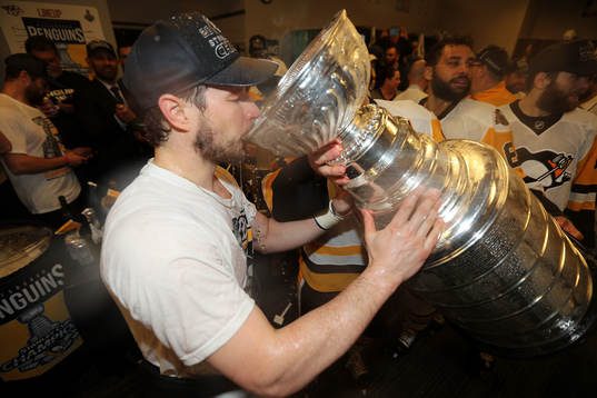 Captain Sidney Crosby #87 of the Pittsburgh Penguins drinks