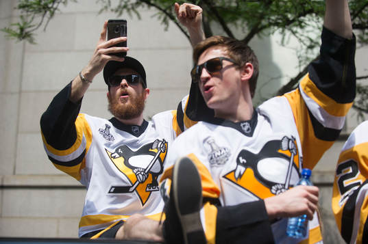 Pittsburgh Penguins' Tom Kuhlhachl (left)