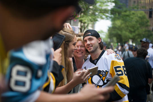Pittsburgh Penguins' Kris Letang and Ian Cloe celebrate