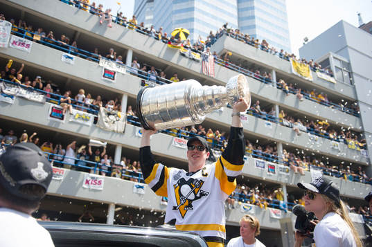Pittsburgh Penguins' Sidney Crosby lifts the Stanley Cup