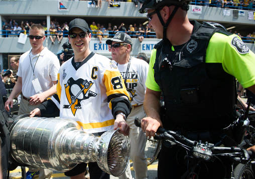 Pittsburgh Penguins' Sidney Crosby lifts the Stanley Cup