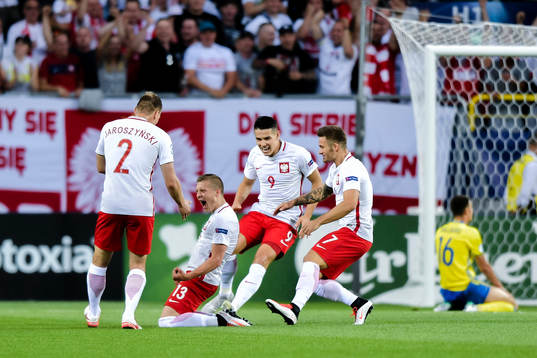 Polens spelare jublar