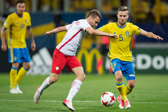 Polens Przemyslaw Frankowski och Sveriges Adam Lundqvist