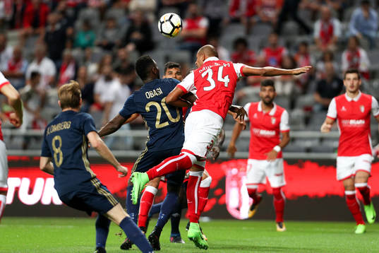 Chinedu Obasi forward of AIK (R) vies with Raul Silva