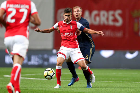 Per Karlsson defender of AIK (R) vies with Rui Fonte