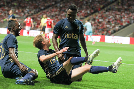 Chinedu Obasi forward of AIK celebrates
