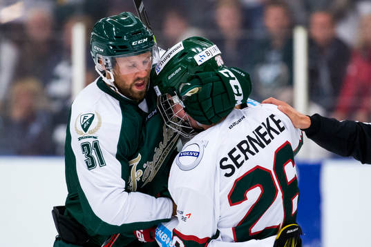 Färjestads Dick Axelsson och Frölundas Rasmus Dahlin i