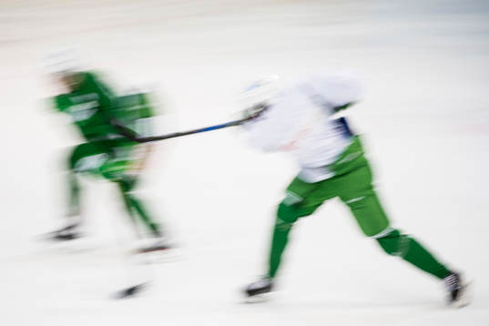 En generell bild av spelare i rörelseskärpa som skjuter