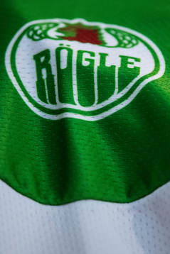 Rögles klubbmärke på en tröja