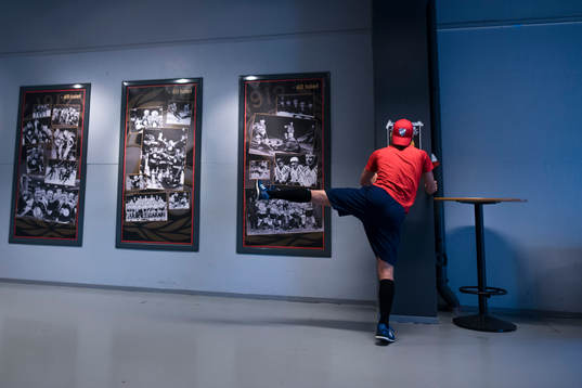 A player of Helsinki warms up prior the CHL game between