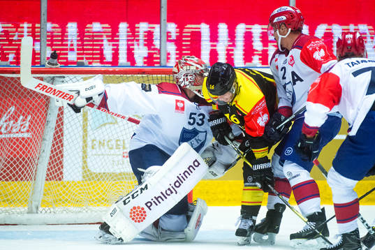 Daniel Pailleof Brynäs collides with Goalkeeper Atte
