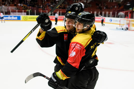 Aaron Palushaj of Brynäs celebrates with teammate Jesper