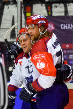 Juhani Tyrväinen and Henri Tamminen of Helsinkicelebrates