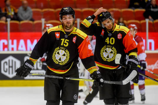 Simon Bertilsson and Jesper Jensen of Brynäs looks dejected