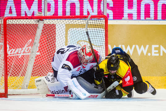 Kevin Clark of Brynäs collides with Goalkeeper Atte Engren