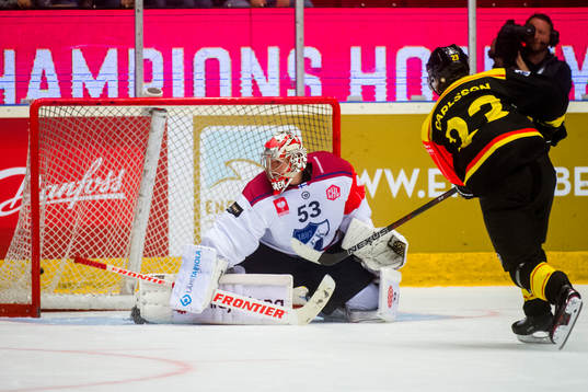 Lucas Carlsson of Brynäs scores a penalty shot behind