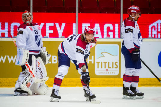 Goalkeeper Atte Engren and Henri Tamminen of Helsinki looks