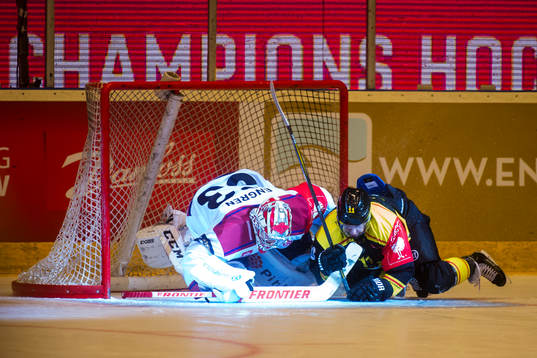 Kevin Clark of Brynäs collides with Goalkeeper Atte Engren