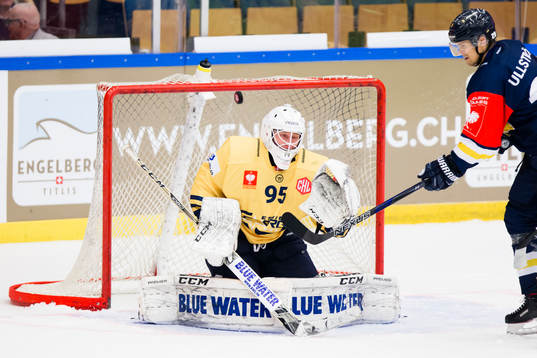 Goalkeeper Nicolaj Henriksen of Esbjerg lets in a shot from